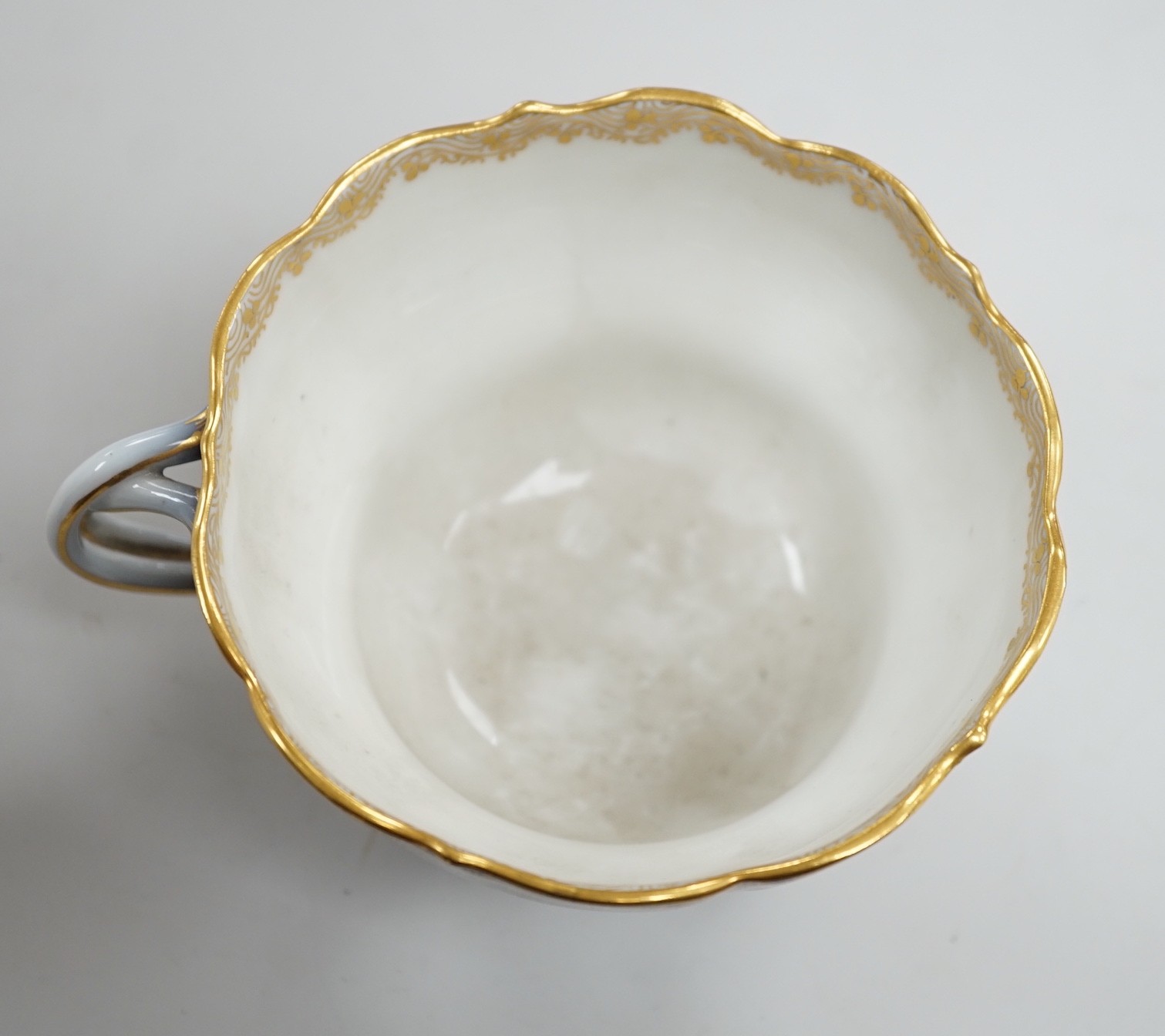 A 19th century Meissen topographical breakfast or tea cup, 8cm tall